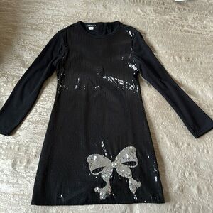 Black sequined Size 8 dress.  Brand is Kate Mack. Backside doesn’t have sequins.